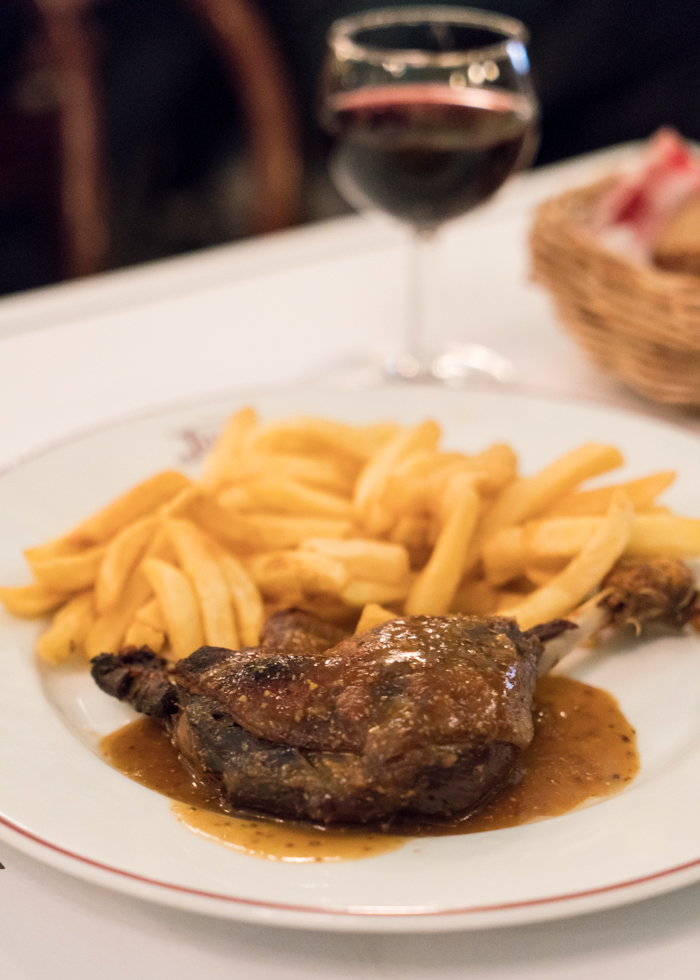 traditional French cooking CONFIT DUCK LEG, FRENCH FRIES