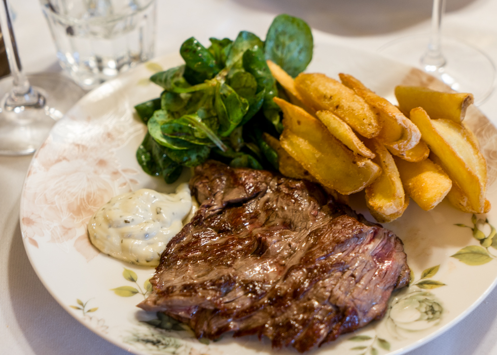 Tender Beef Steak served with crispy fries, French restaurant
